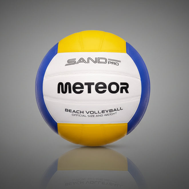 Meteor Sand Pro strandröplabda hivatalos méretben és súlyban, kék-sárga-fehér kialakítással, puha PVC borítással.