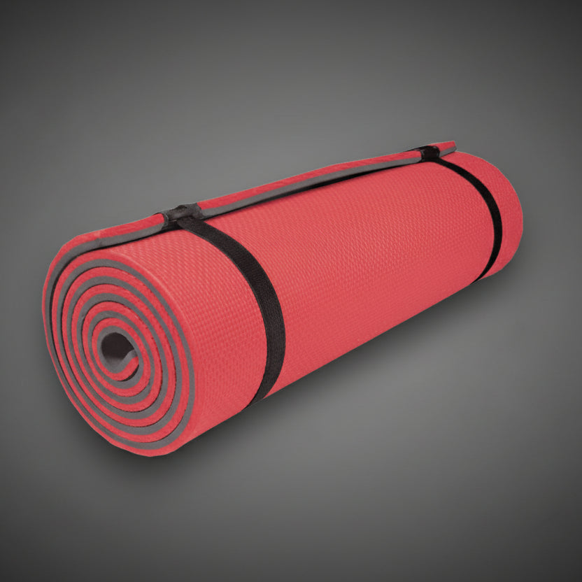 Spokey Sleephiker Big 2 rétegű EVA túramatrac feltekerve, rögzítő pánttal, kempingezéshez és túrázáshoz.