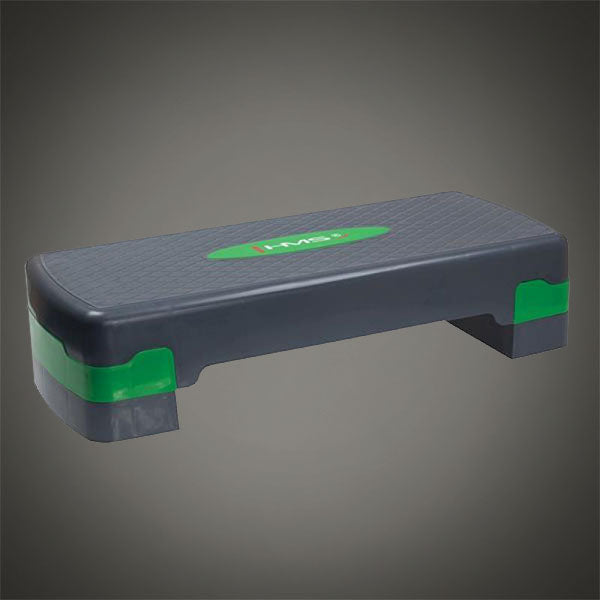 Állítható fitness step platform zöld elemekkel aerobik és funkcionális edzéshez
