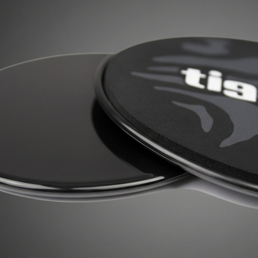 Tiguar csúszókorongok funkcionális edzéshez – kétoldalas kialakítású fitnesz tárcsák a törzsizmok erősítésére és stabilitás fejlesztésére, szőnyegen és kemény padlón is használható az Ifitcore webshopban.